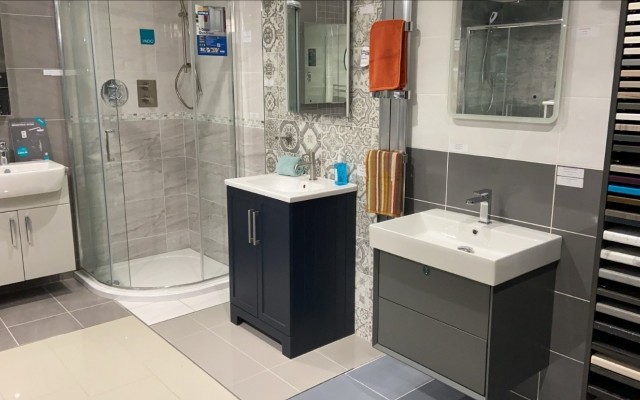 07 - Quadrant Sliding Door Shower Enclosure and two Vanity Units in Croxley Plumbing Supplies Bathroom Showroom at Croxley Green, Rickmansworth