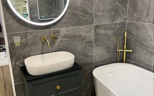 15 - Countertop Vanity Unit below a Large Round LED Mirror in Croxley Plumbing Supplies Bathroom Showroom at Croxley Green, Rickmansworth