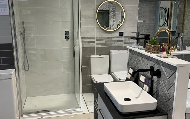 10 - Square Pivot Door Shower Enclosure, Wall-hung Vanity Unit and two Toilets in Croxley Plumbing Supplies Bathroom Showroom at Croxley Green, Rickmansworth